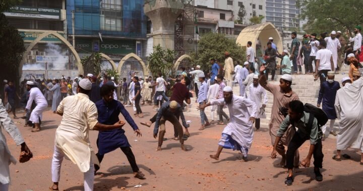 Two factions of protesters clashed in Dhaka on Friday, sparked by Mr. Modi’s visit to Bangladesh.